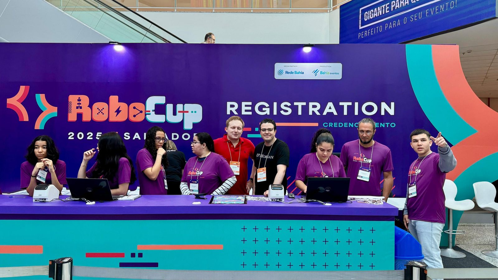 RoboCup Registration desk with Marek Šuppa on RoboCup 2025 in Salvador, Brazil.