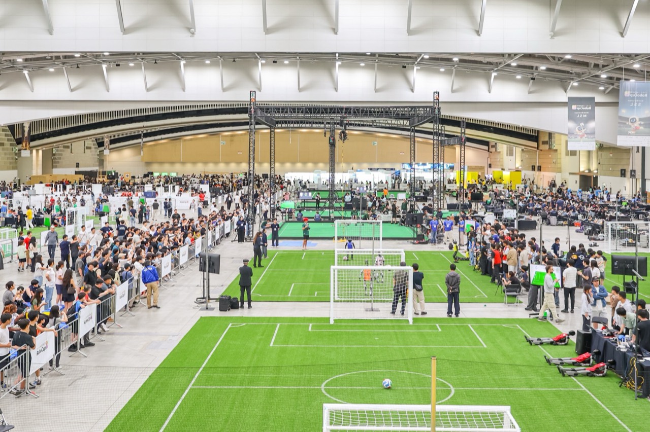 RoboCupSoccer Humanoid League robots on the pitch
